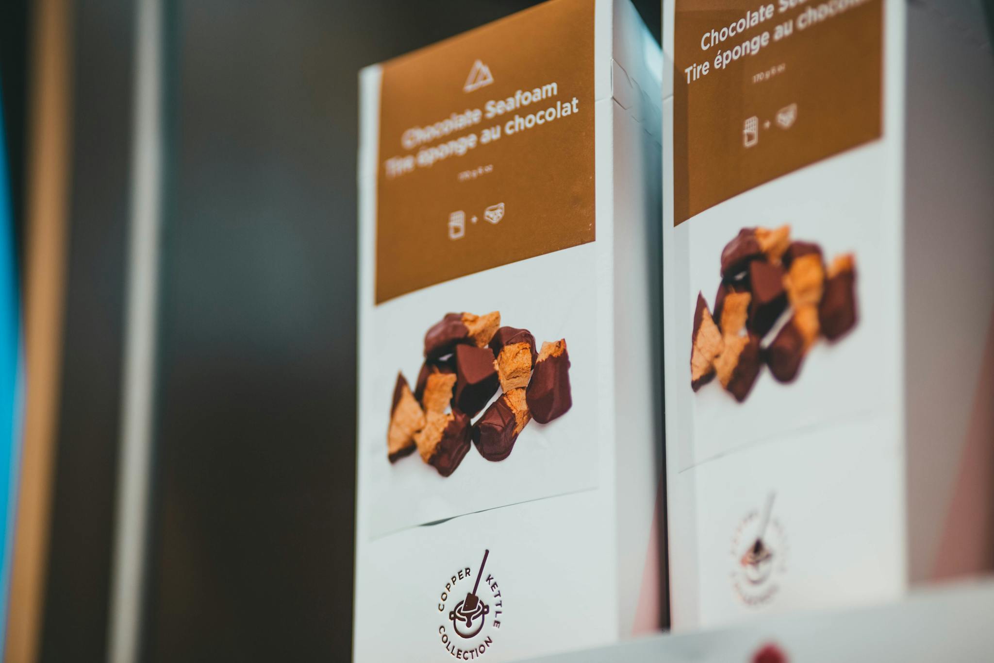 A sophisticated display of chocolate seafoam packaging from Copper Kettle Collection.