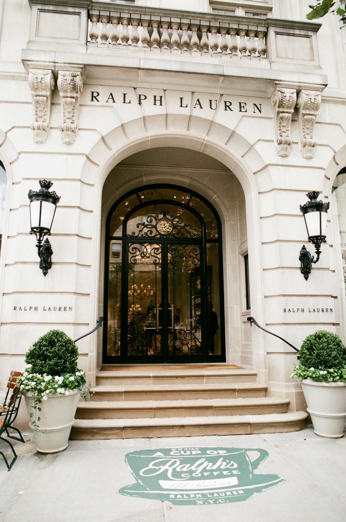 Classic exterior of a Ralph Lauren store with an ornate entrance.